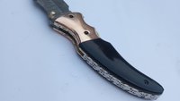 8” trailing point folder with copper